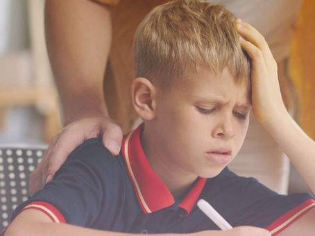A child struggling with his homework