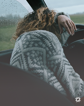Woman sitting in car