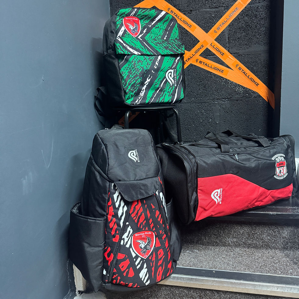Green, black, and red team bags with logo