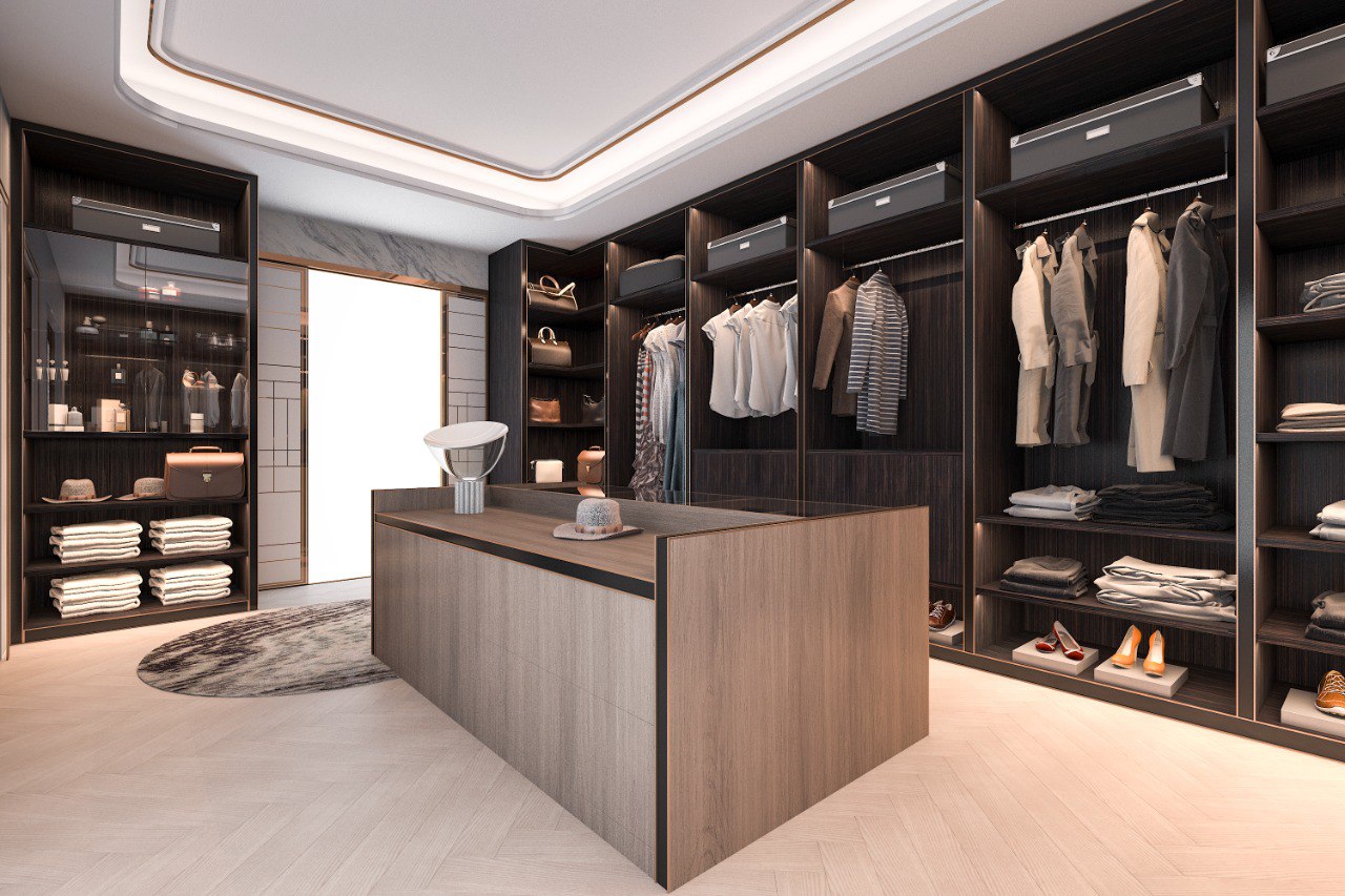 Modern walk-in closet with organized clothes, shoes, and storage cabinets in home.
