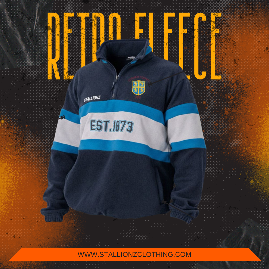 Navy retro fleece, blue and white stripes, with 'EST. 1973'