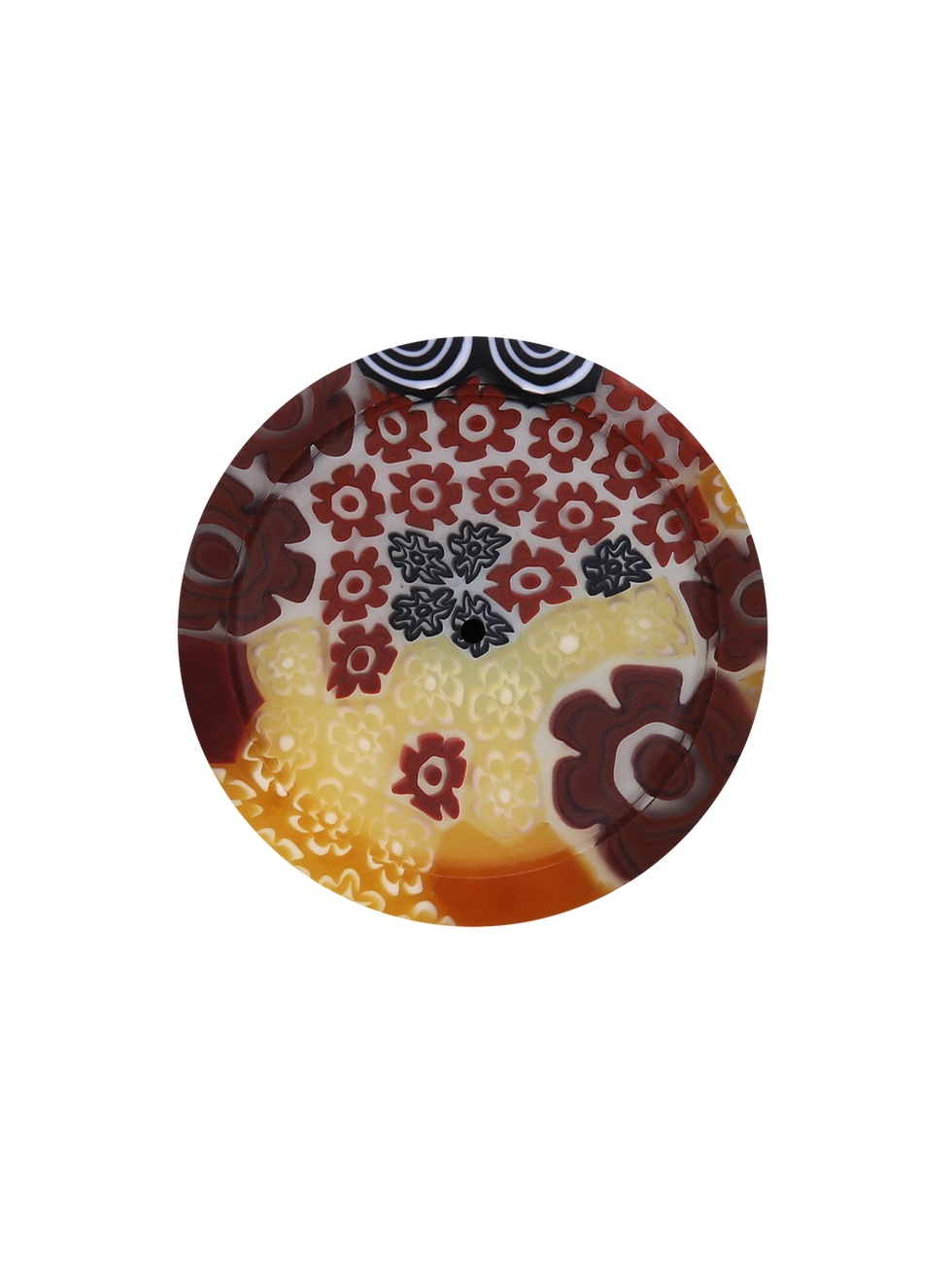 Circular glass bead with red, yellow, and black floral patterns