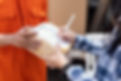 close-up-person-signing-parcel-delivery.jpg