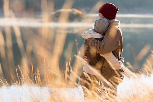 back view of lovely young couple hugging