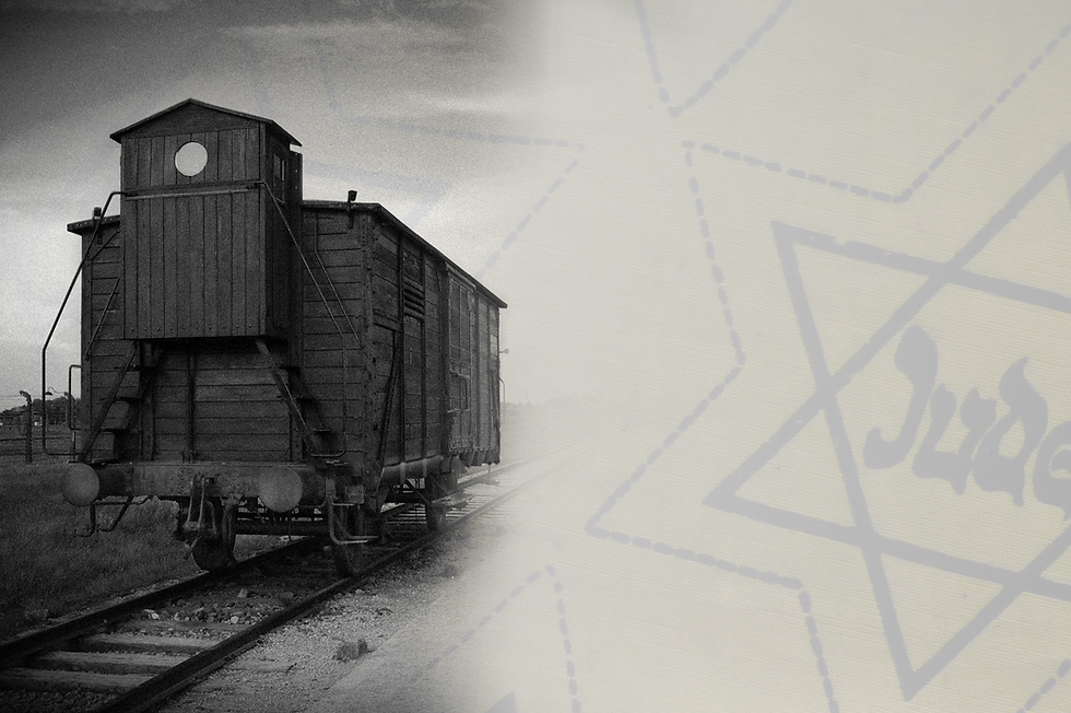 Wagon in Auschwitz met Jodenster op de achtergrond
