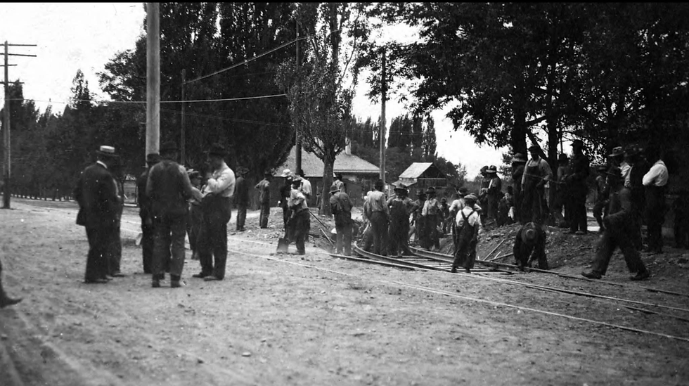 The tracks joining the new, shortened tracks from the south with the tracks going north. The "town spur" is noted that went east up Forest St. October 27, 1915. https://collections.lib.utah.edu/ark:/87278/s6mg7z1m