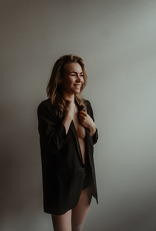 Portret van Mignon, boudoirfotograaf van SHE Boudoir