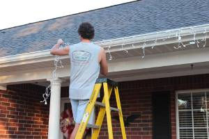 Hanging Christmas lights using Christmas Hook