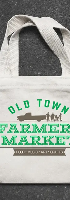 A cnavas tote bag imprinted with the Old Town Farmers Market logo.