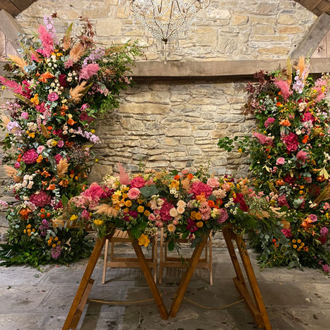 Floral towers - broken arch - wedding ceremony with register table flowers
