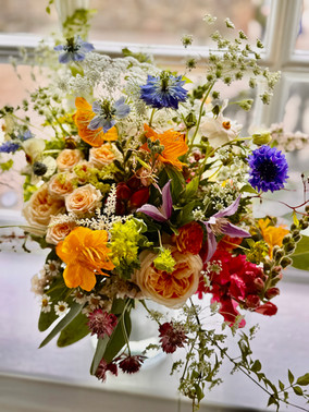 jewel colour flowers; blue, orange, yellow, pink, purple, lilac