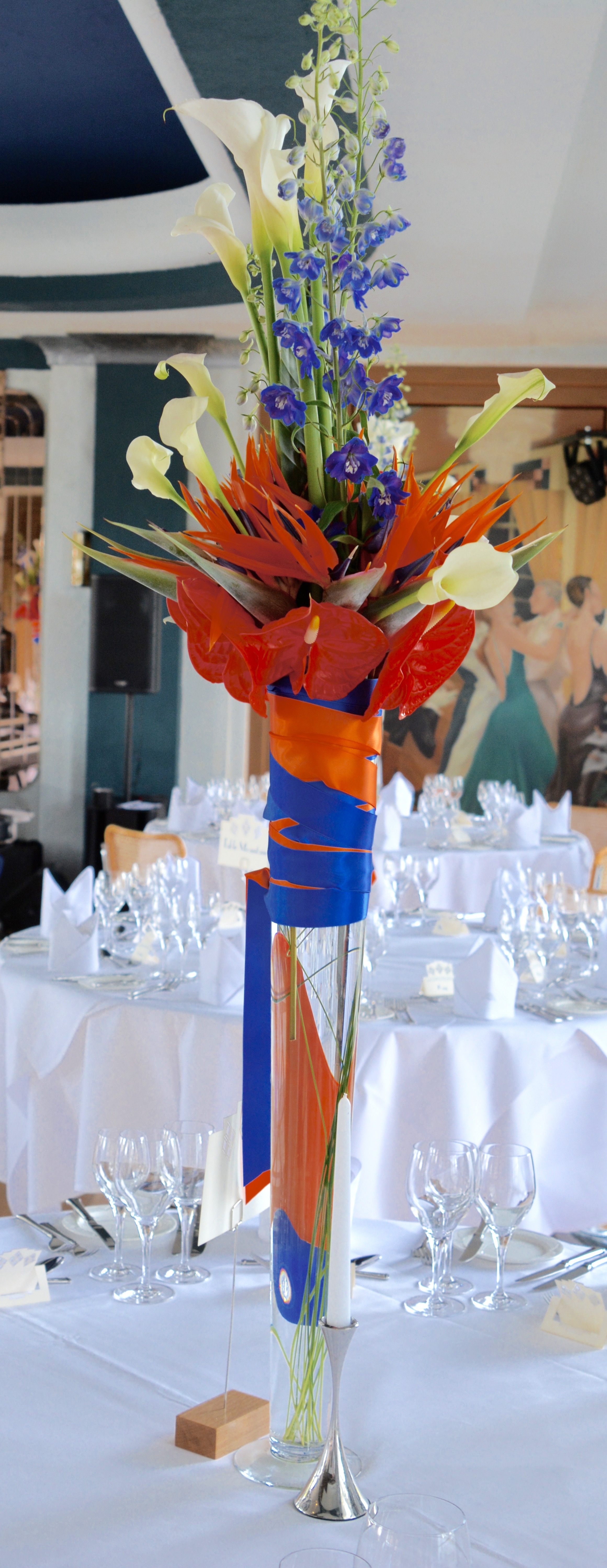 Tall vase with tropical flowers