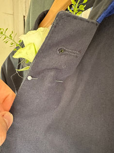 pinned buttonholes from back of lapel