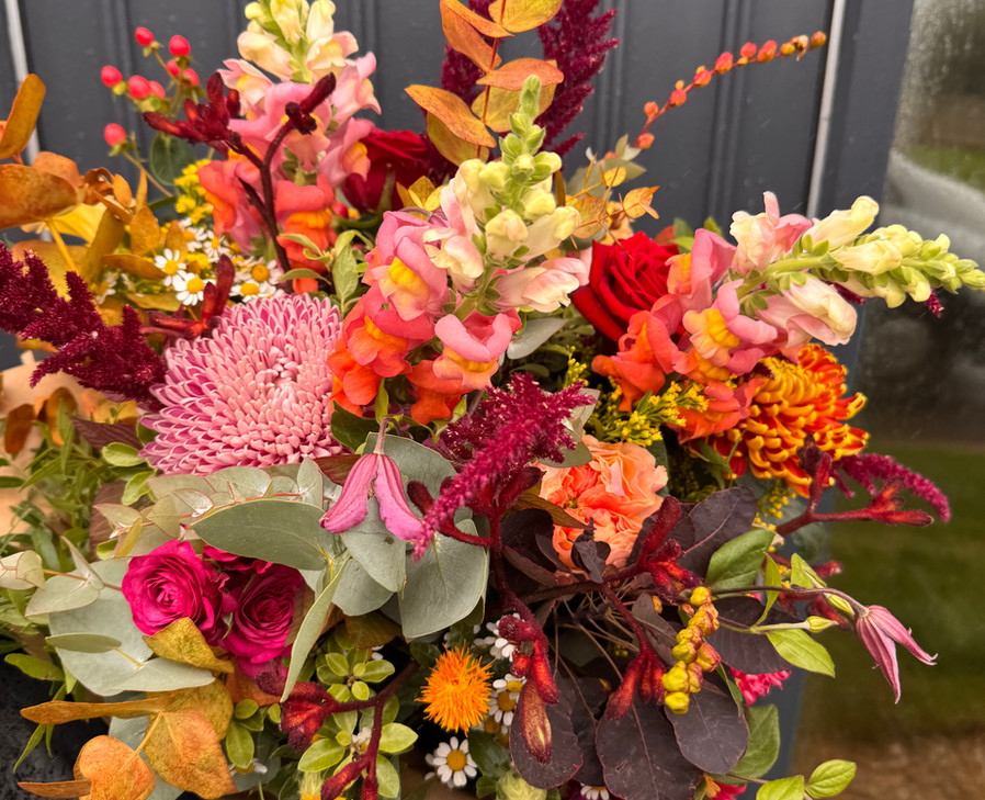 Autumnal flowers bouquet at delivery address