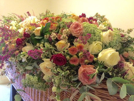 fresh flowers and coffin