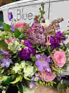fresh flowers, hand-tied bouquet, lilac, roses, freesias, stocks, vehicle, van Blue Geranium logo