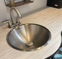 Replace RV bathroom sink for larger stainless sink