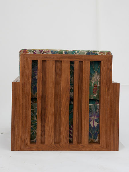Bespoke oak lounge chair designed by P.H.I. Interior