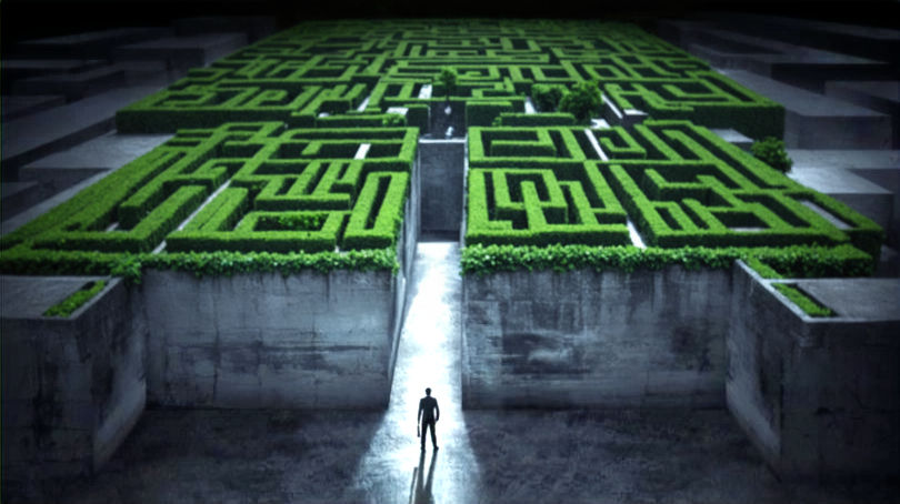 A lone figure stands at the entrance of a vast, dimly lit concrete maze, symbolizing the confusion and emotional complexity of repeating past relationship patterns.