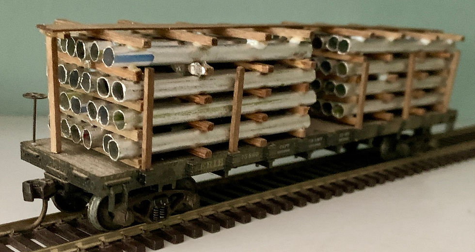 ERIE 40' Flat Car +  Twin Stack Pipe Load  -  HO