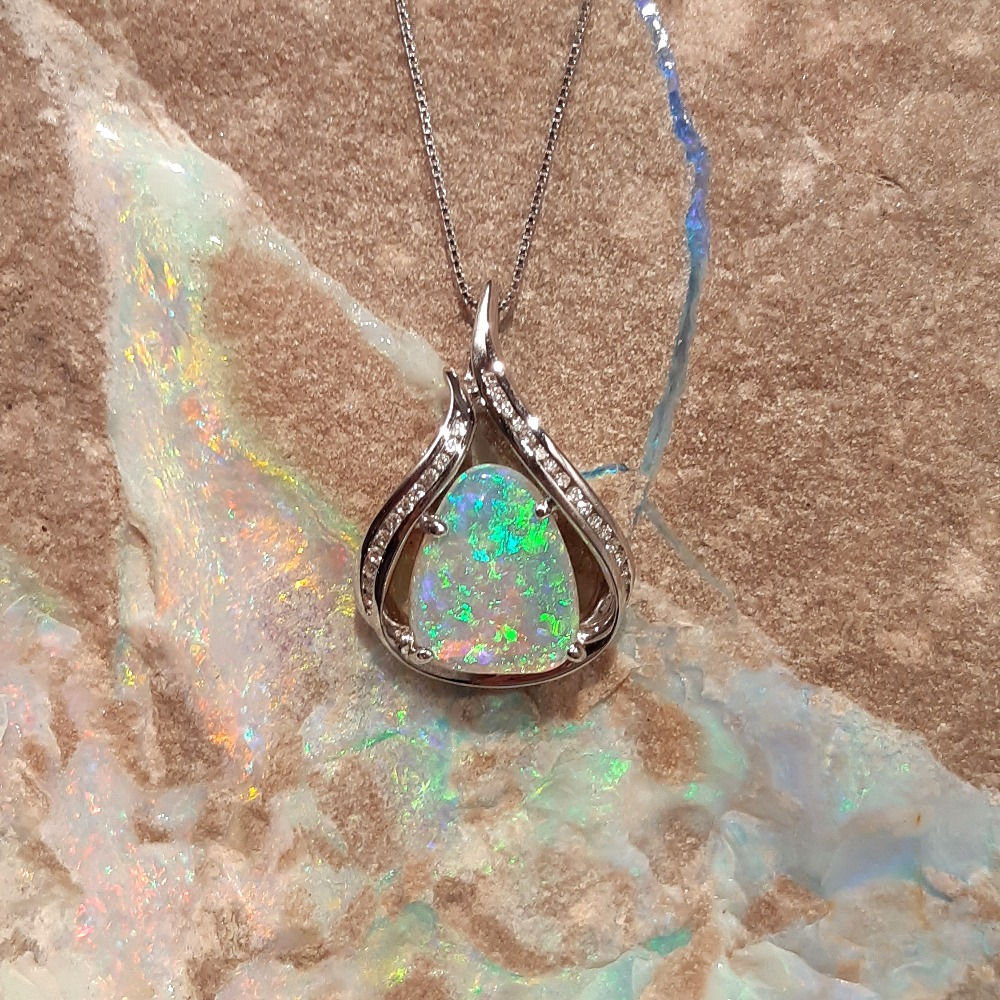 Solid Crystal Opal Fossil and Diamond Pendant