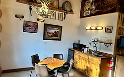 Queen Inn Room interior with dining area at Soap Lake Resort