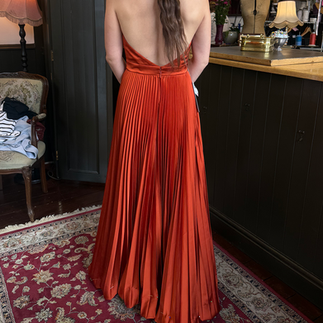 IMAGE Tailors Finsbury Park specialise in expert dress alterations for your special occasion. Book y