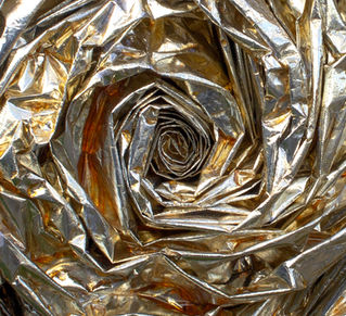 Golden rose wall hanging that gives a room instant joy colour and sets it apart from the rest.