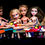 Thumbnail: Detail of Bratz dolls seated at the table in Influencers’ Last Supper, highlighting glossy finishes and bold expressions.