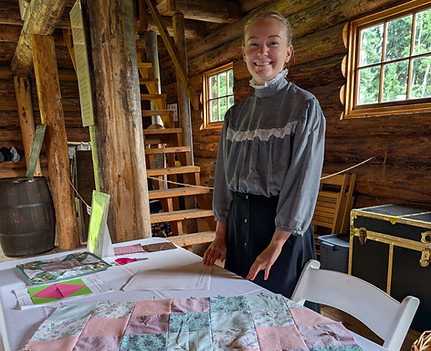 Kendra and quilting at Huble Homestead