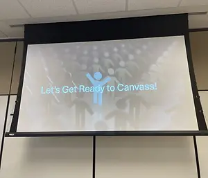 In a conference room on a rainy Saturday afternoon, freshly trained volunteers are hitting the phones to remind people to vote in the general elections this November. But getting people to engage with the issue of voting can be tricky. 