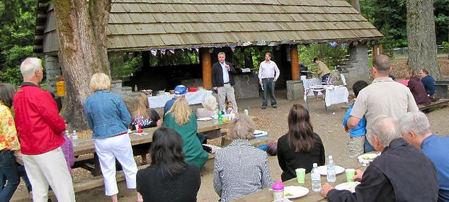Judge Bryan Chushcoff and Winston campaigning at Point Defiance Park