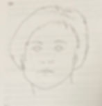 drawing of a female person on white paper.