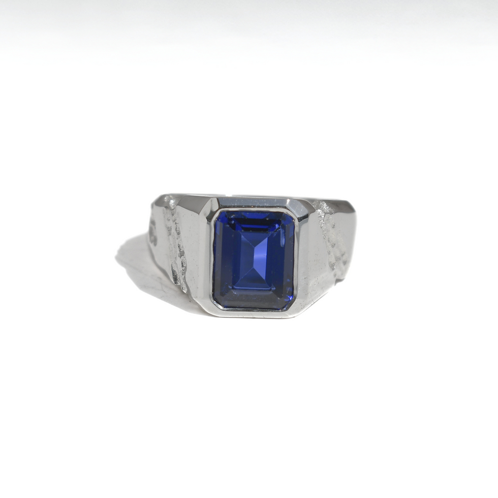 Thumbnail: Handmade silver ring with 10x8 mm lab sapphire, emerald cut, bold modern design with textured band.