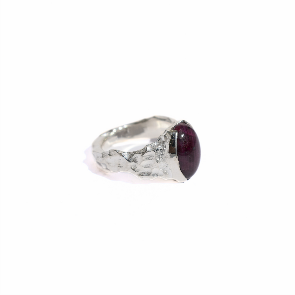 Thumbnail: Sterling silver ring with an oval cabochon ruby, set in a bold and raw organic handcrafted texture.