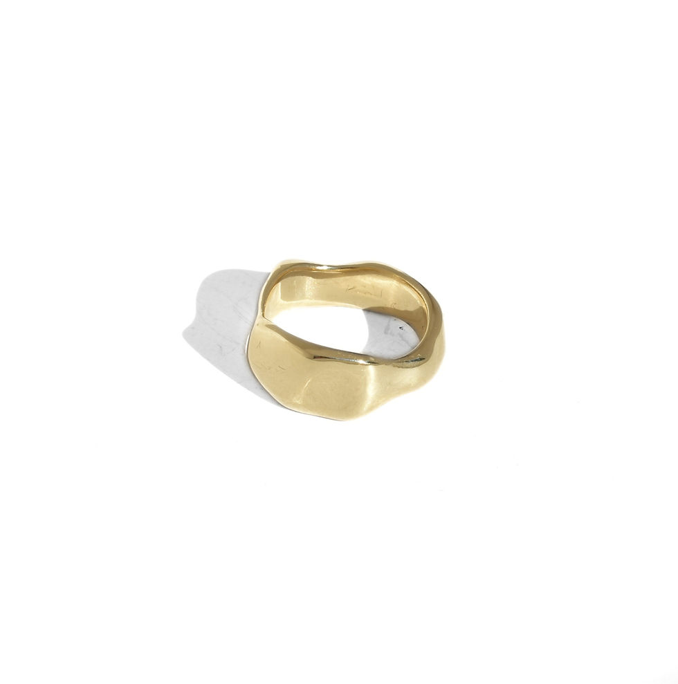 14k solid gold organic band with asymmetrical curves and minimalist contemporary design.