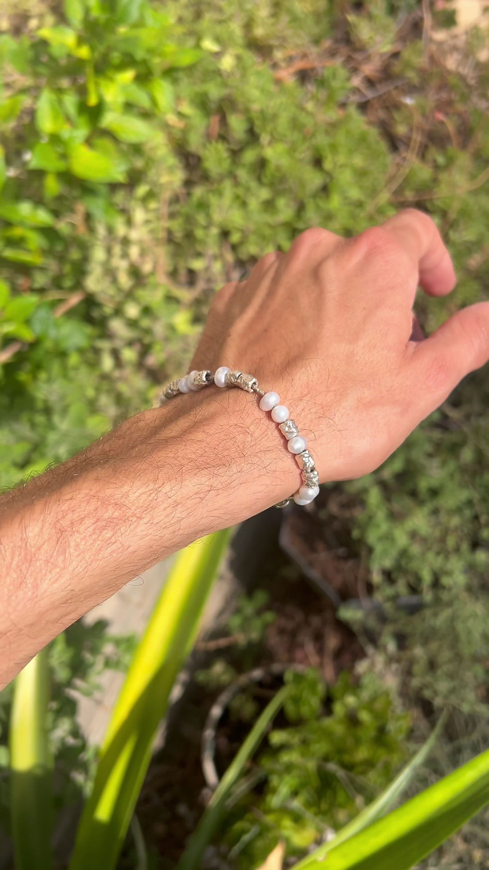 Thumbnail: Handmade sterling silver and freshwater pearl bracelet with raw textured silver beads and organic design.