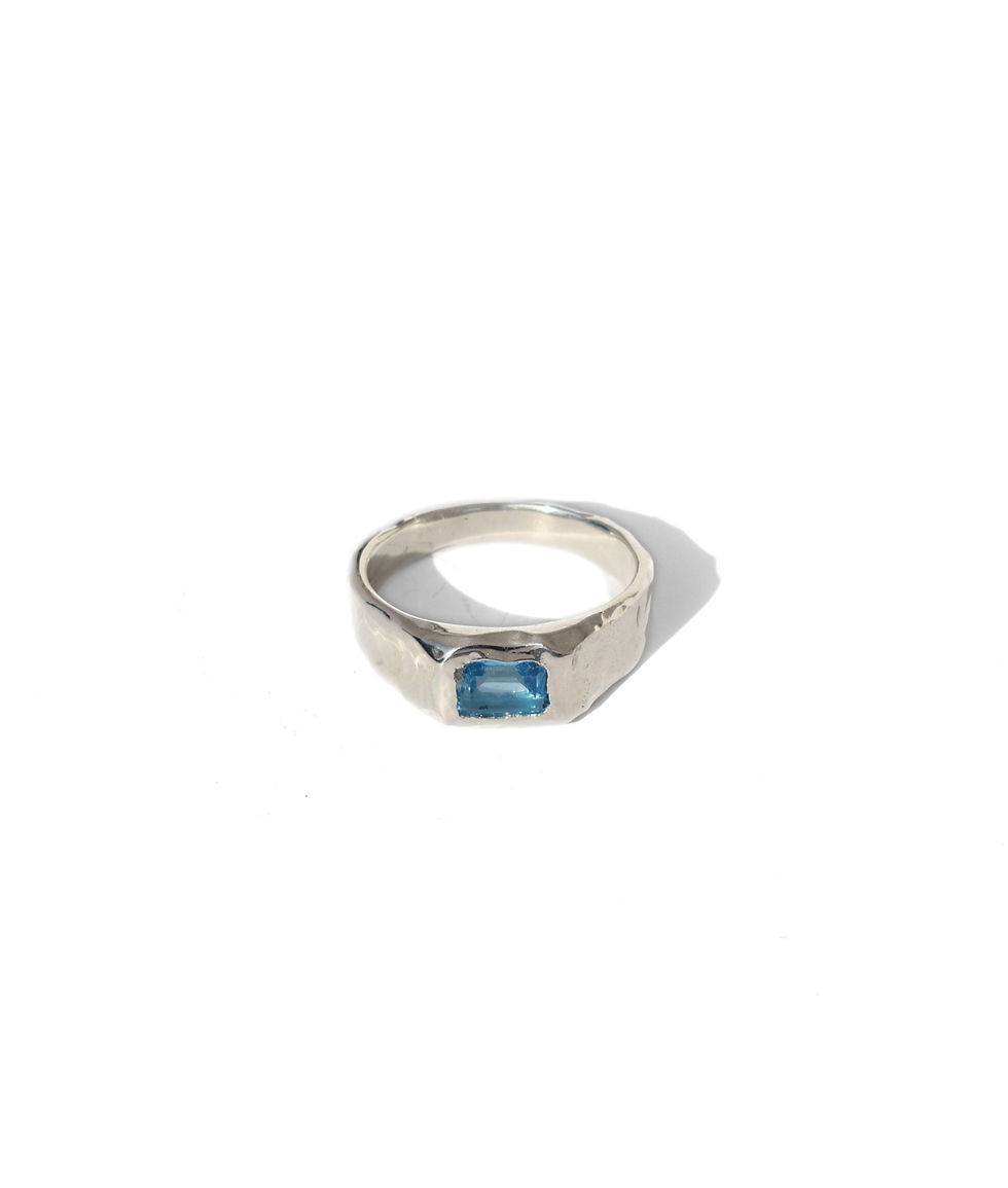 Thumbnail: Handmade sterling silver ring with rectangular blue topaz, polished organic gemstone band with sculptural silver design