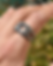 Thumbnail: Oxidized sterling silver ring with raw texture and small gemstones, handcrafted organic statement ring on finger.
