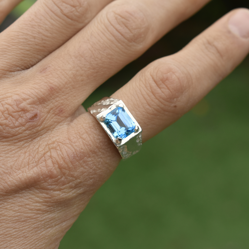 Thumbnail: Elegant high-polish ring with emerald-cut topaz, the November birthstone, symbolizing strength & beauty