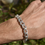 Thumbnail: Handmade silver chain bracelet with textured organic links, bold chunky design, worn on wrist in natural light