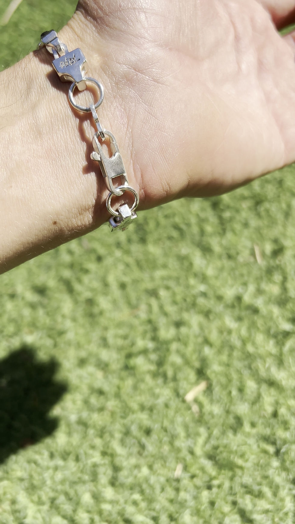 Thumbnail: Sterling silver bracelet with hammered finish and garnet stones, bold and unique handmade jewelry.