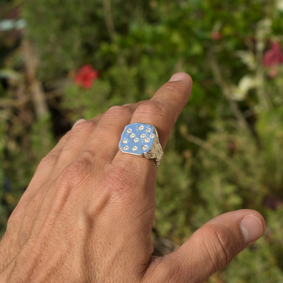 Thumbnail: Sterling silver ring with asymmetrical polished face and 12 diamond stones on a raw textured band.