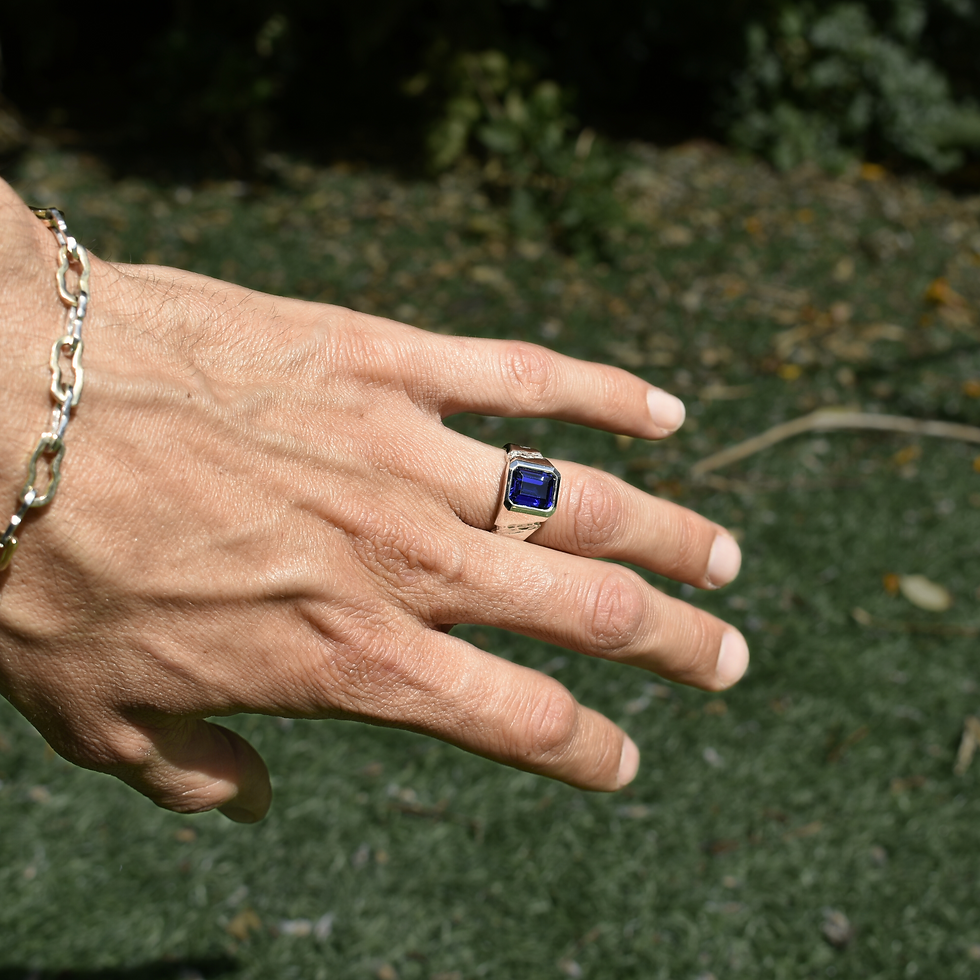 Thumbnail: Handmade silver ring with 10x8 mm lab sapphire, emerald cut, bold modern design with textured band.
