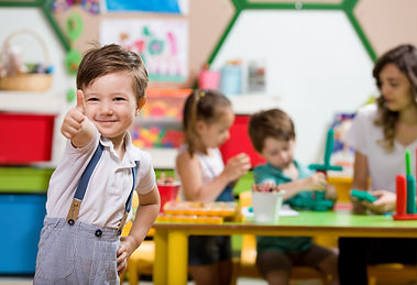 Preschool Children and Teacher in Classr