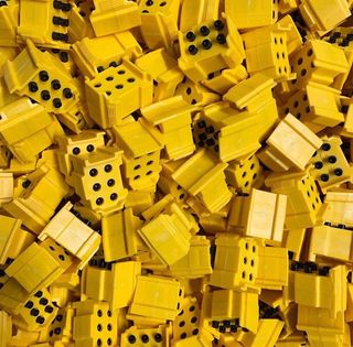 Image shows a pile of braille blocks