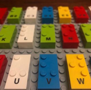 Image shows braille alphabet Lego