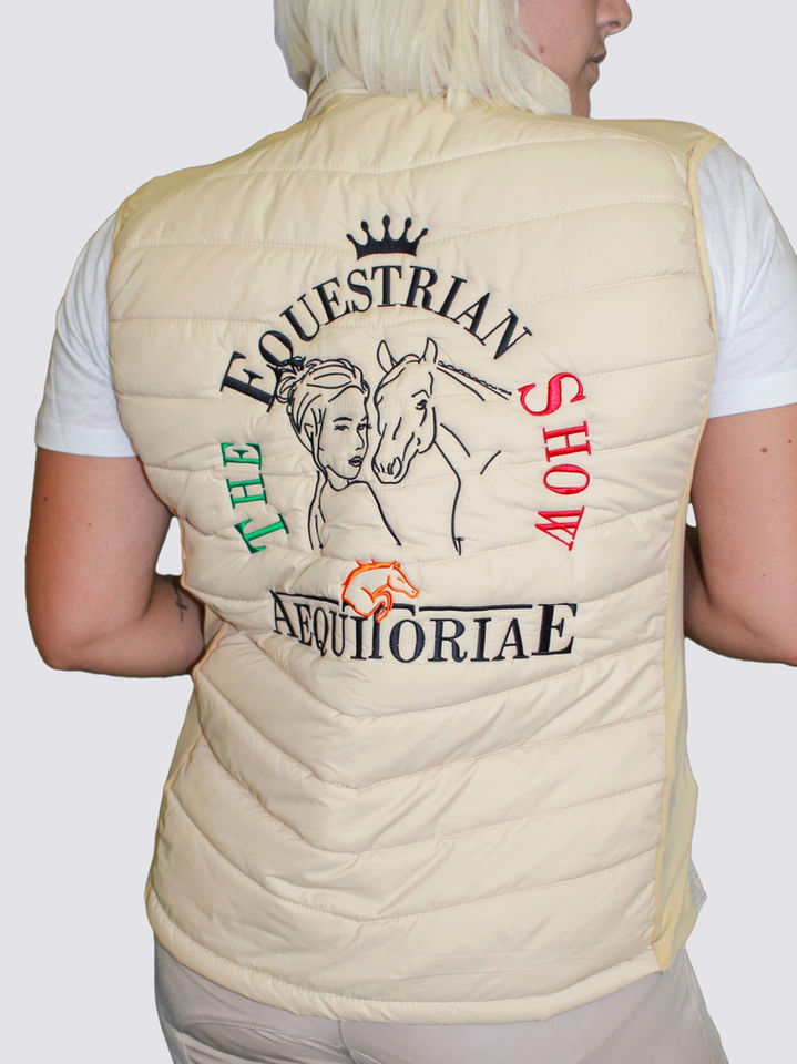 Back view of beige vest with the equestrian show graphics