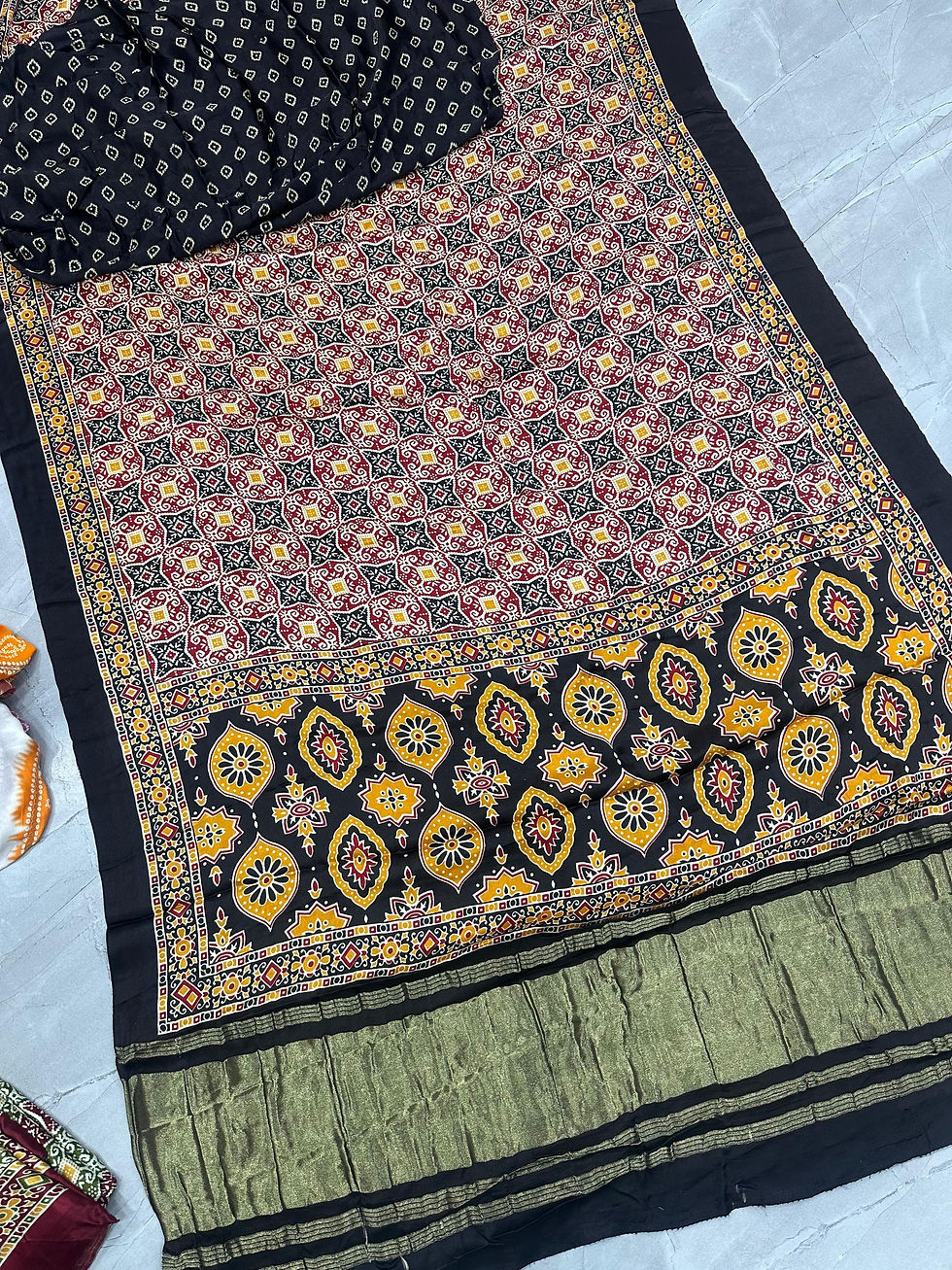 थंबनेल: RANG BHOOMI - GAJJI SILK SAREE WITH AJARKH PRINT & LAGDI PALLU - LILLEMART.COM