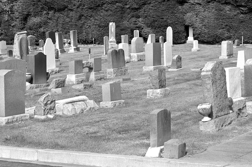 a graveyard with headstones